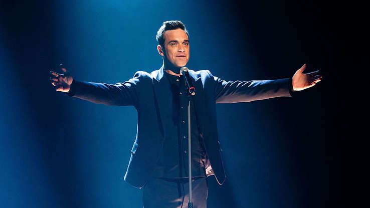 Robbie Williams cumple hoy 49 años: cinco curiosidades que quizá no sabías del cantautor británico